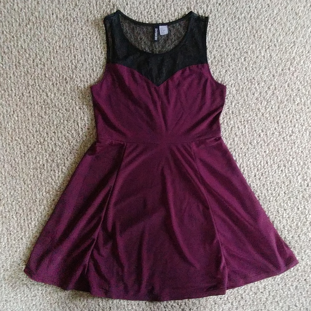 Sleeveless plum dress with black lace neckline